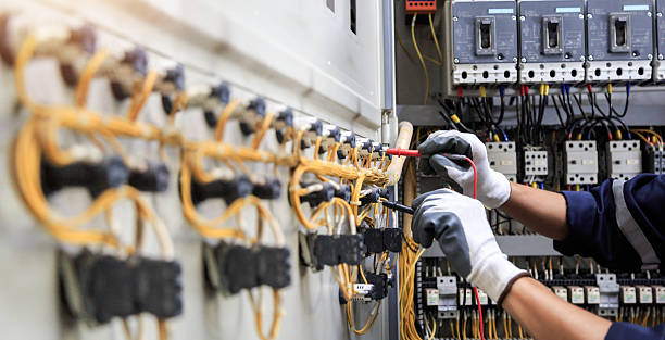 Professional Electrician technician working in Montgomery Village, MD